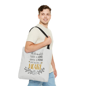A Teacher takes a hand, opens a mind, and touches a heart, Tote Bag