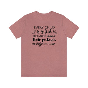 Every child is gifted they just unwrap their packages at different times shirt, autism teacher shirt